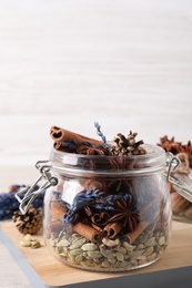 Photo of Aroma potpourri with different spices on white table