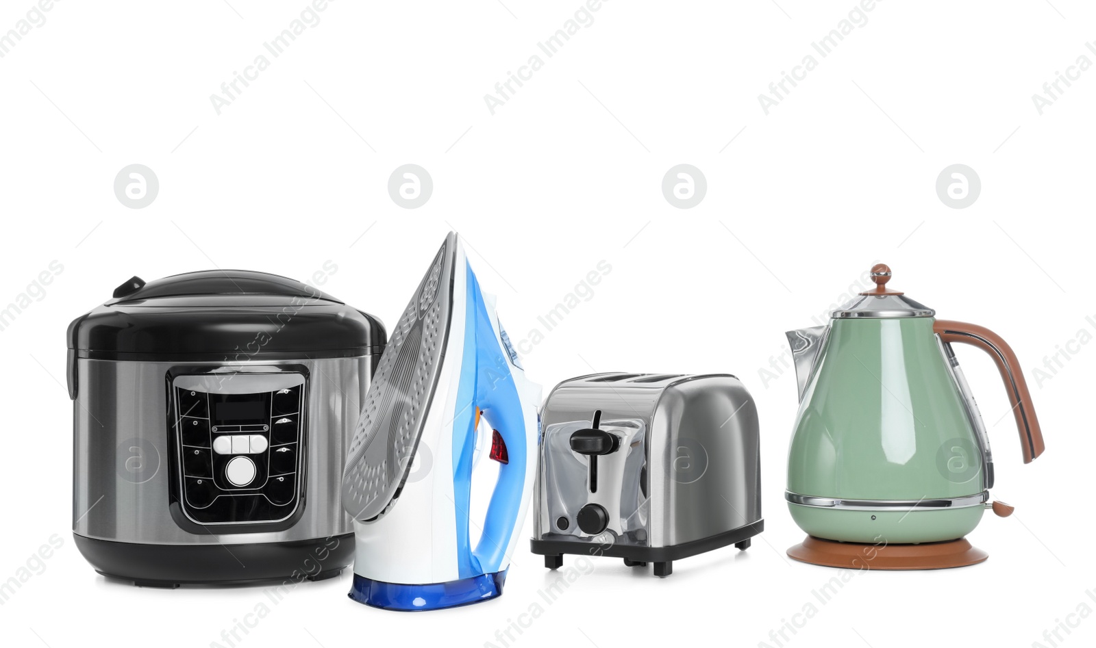 Photo of Set of modern home appliances isolated on white