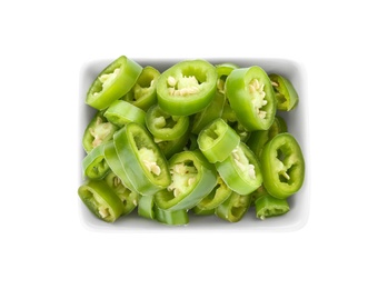 Photo of Bowl with cut chili peppers on white background, top view