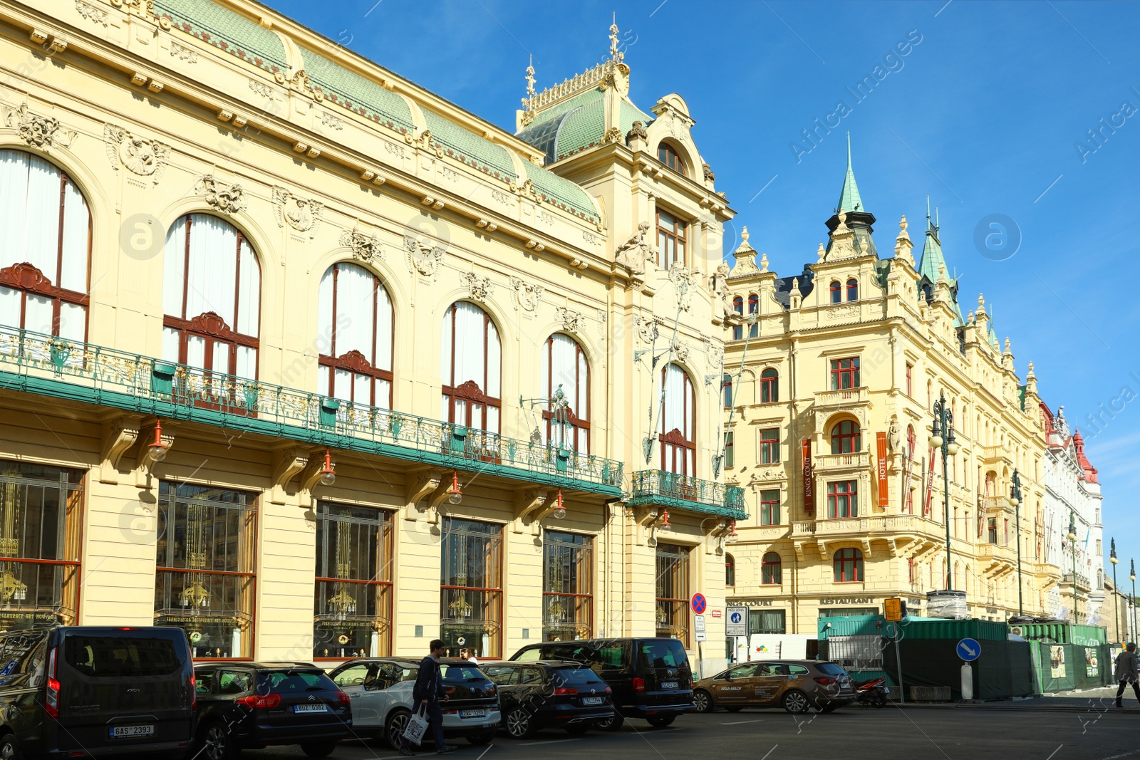 Photo of PRAGUE, CZECH REPUBLIC - APRIL 25, 2019: City street with Municipal House and Kings Court Hotel