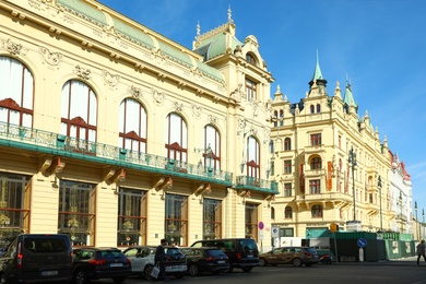 PRAGUE, CZECH REPUBLIC - APRIL 25, 2019: City street with Municipal House and Kings Court Hotel