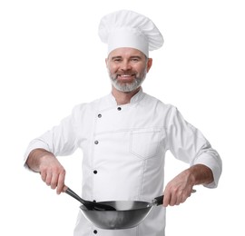 Happy chef in uniform holding wok and spatula on white background