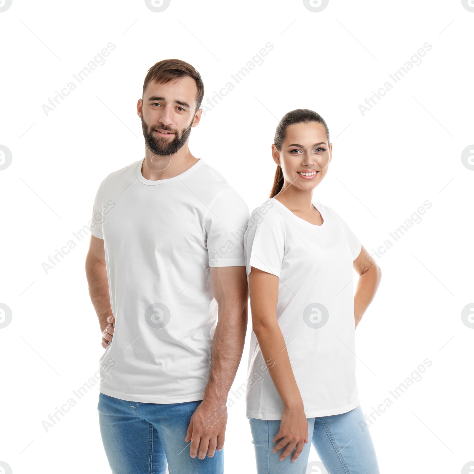 Photo of Young couple in t-shirts on white background. Mockup for design