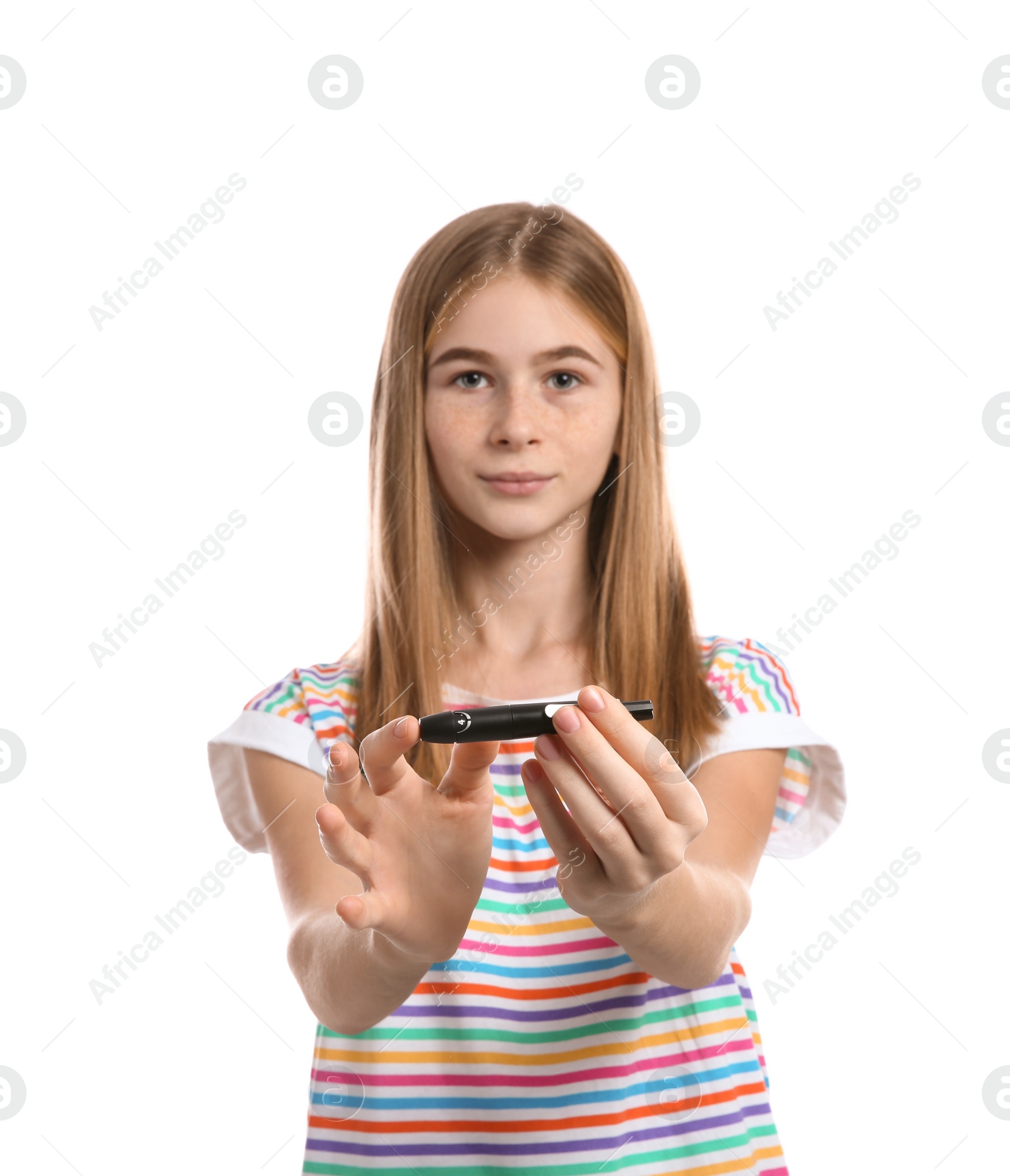 Photo of Teen girl using lancet pen on white background. Diabetes control