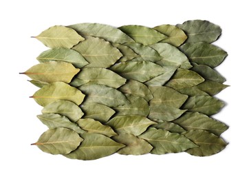 Photo of Aromatic bay leaves on white background, top view