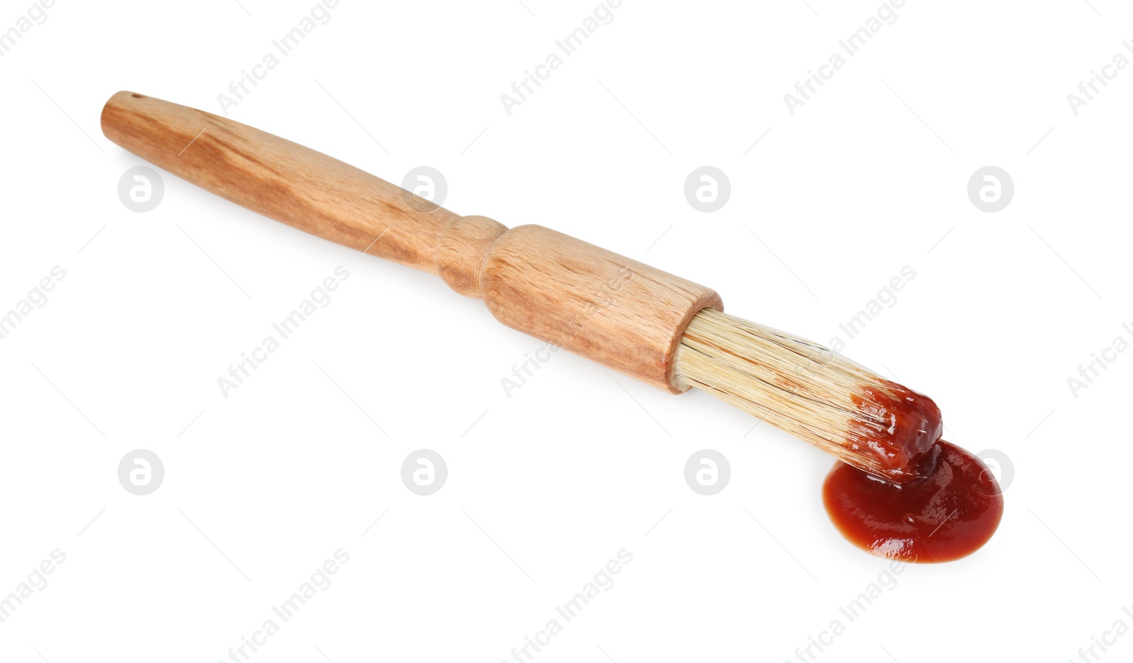 Photo of Brush with tasty barbecue sauce isolated on white