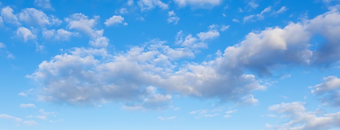 Image of Picturesque view of beautiful blue sky with fluffy clouds on sunny day, banner design