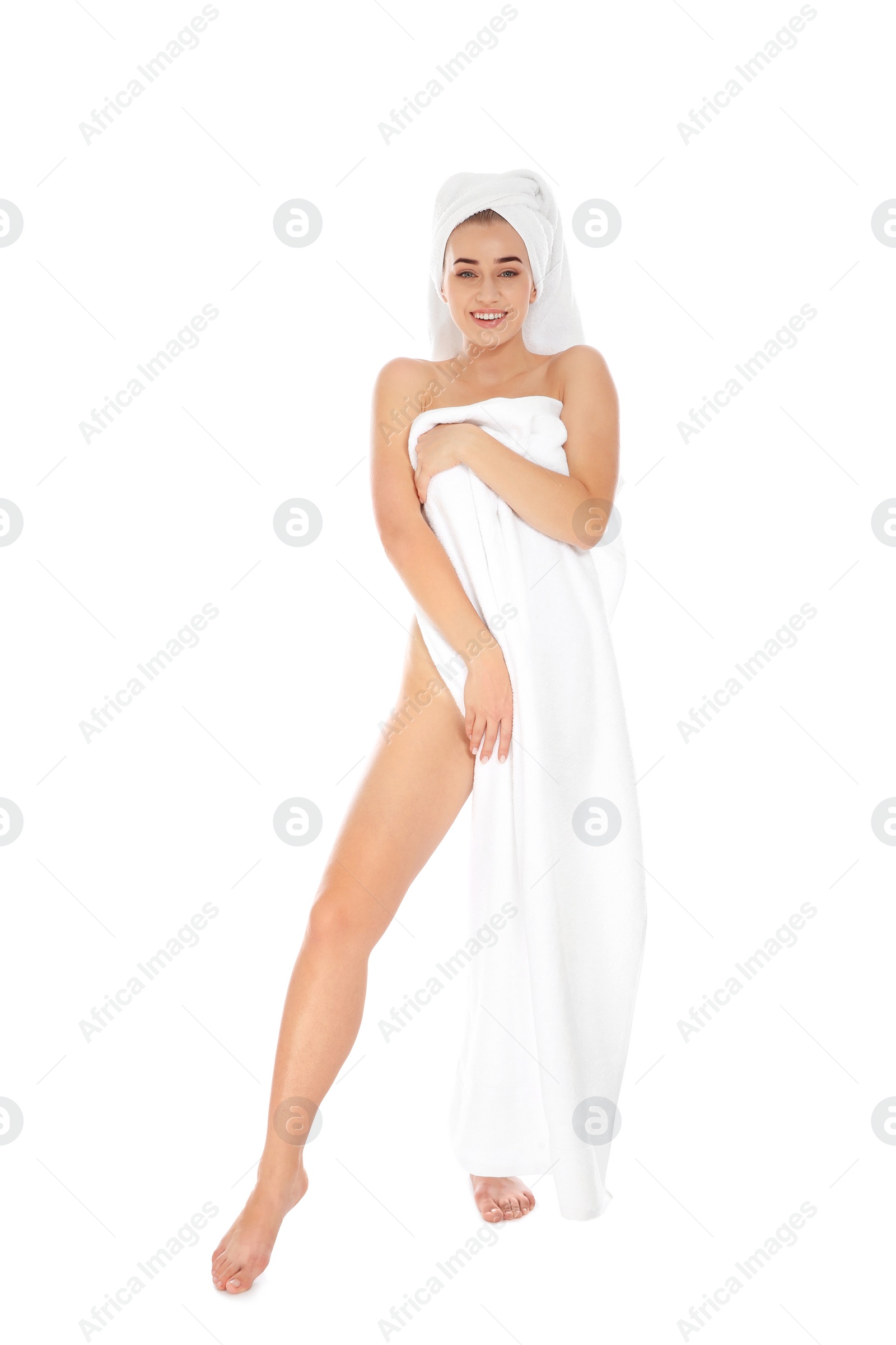 Photo of Full length portrait of young pretty woman with towels on white background