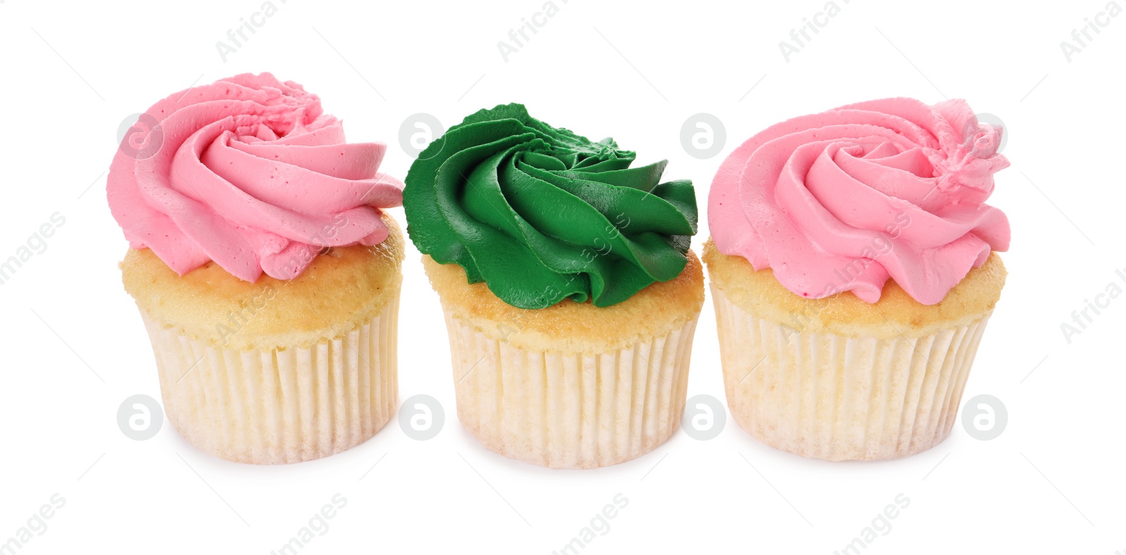 Photo of Delicious cupcakes with bright cream isolated on white