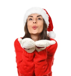 Photo of Young woman in Christmas sweater and hat on white background