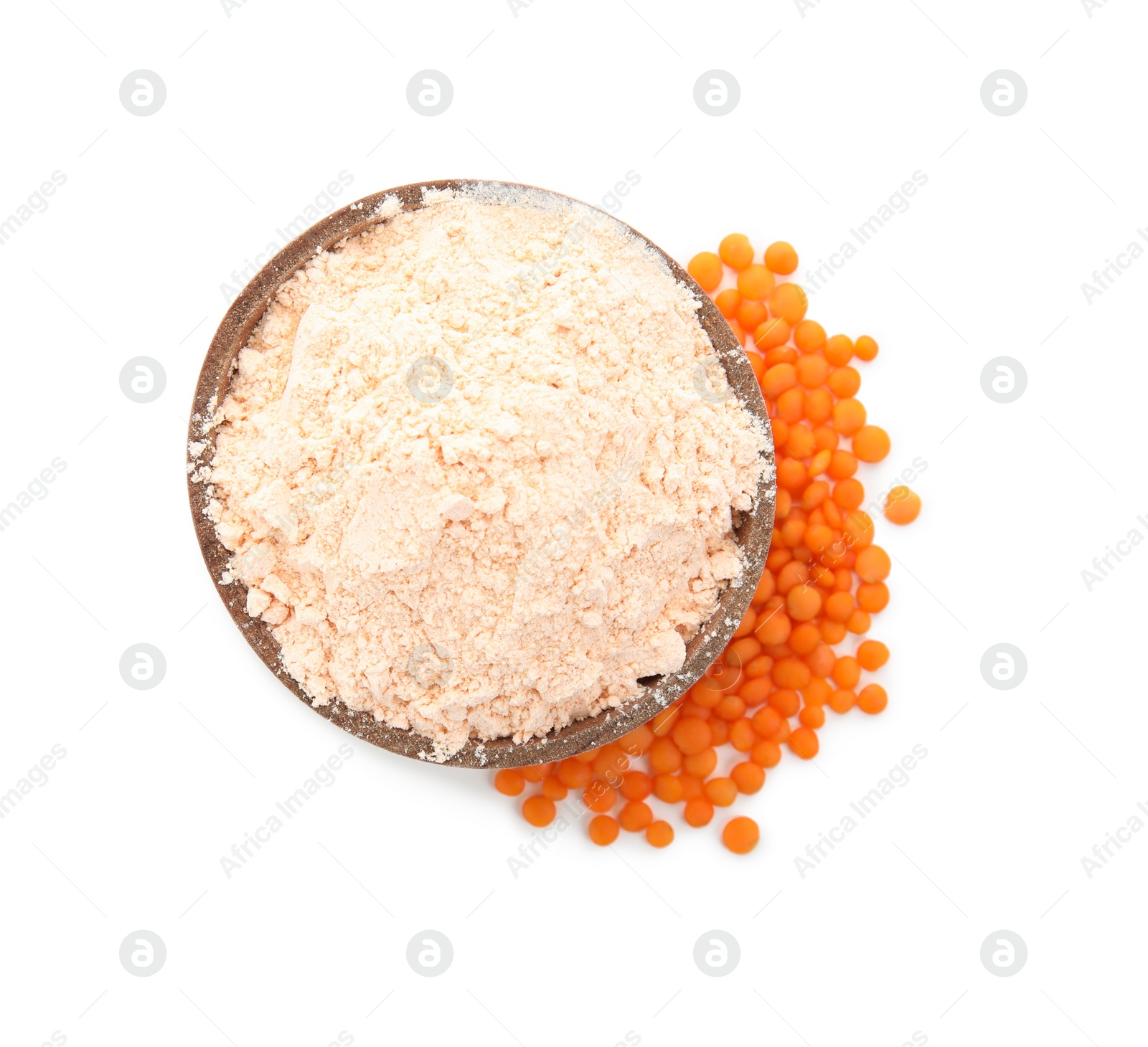 Photo of Lentil flour in wooden bowl and seeds isolated on white, top view