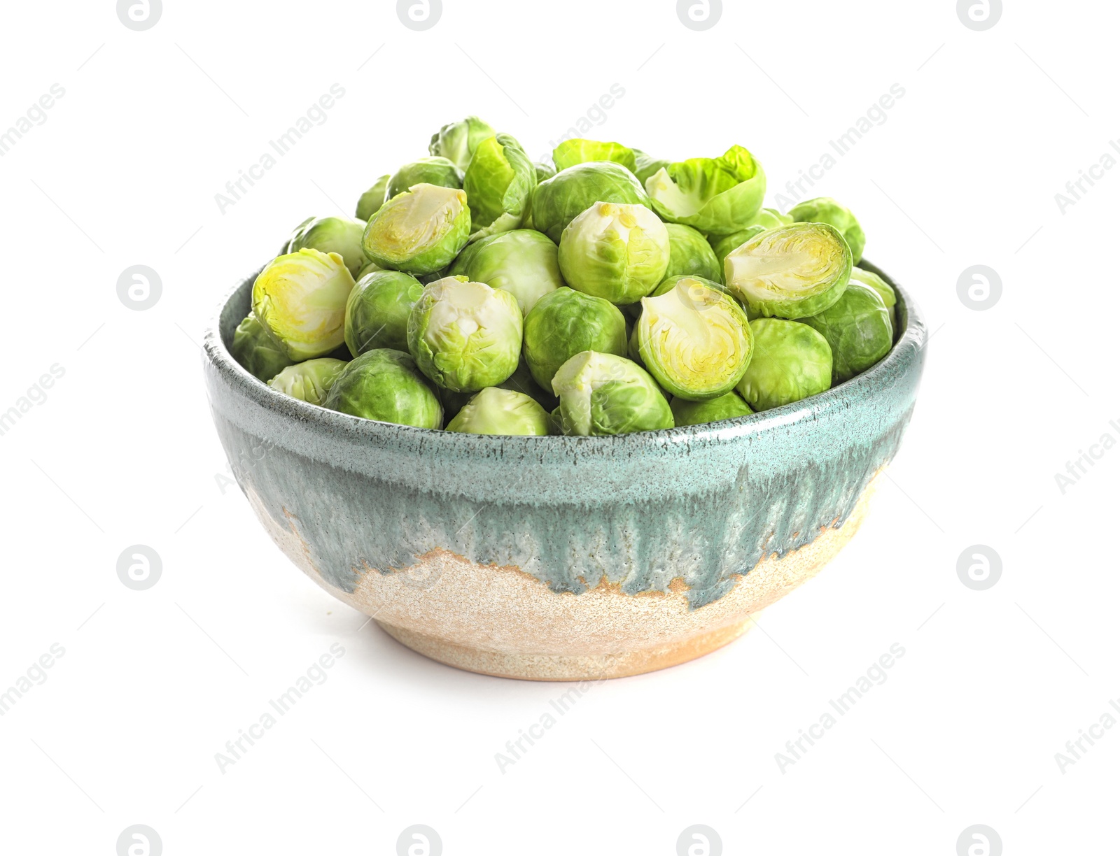 Photo of Bowl of fresh Brussels sprouts isolated on white