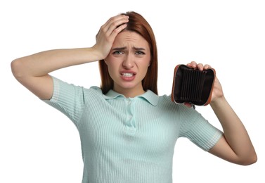 Upset woman with empty wallet on white background