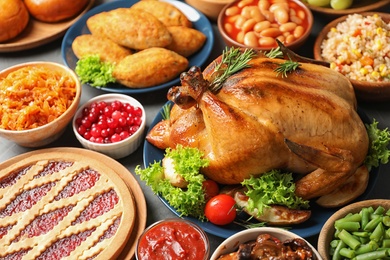 Traditional festive dinner with delicious roasted turkey served on table