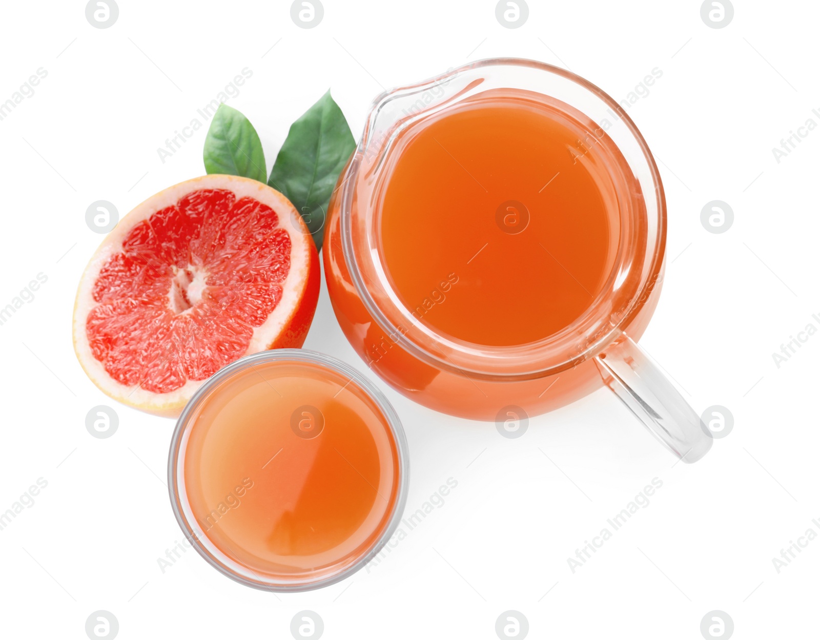 Photo of Tasty freshly made grapefruit juice and fruit on white background, top view