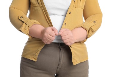 Photo of Overweight woman in tight clothes on white background, closeup