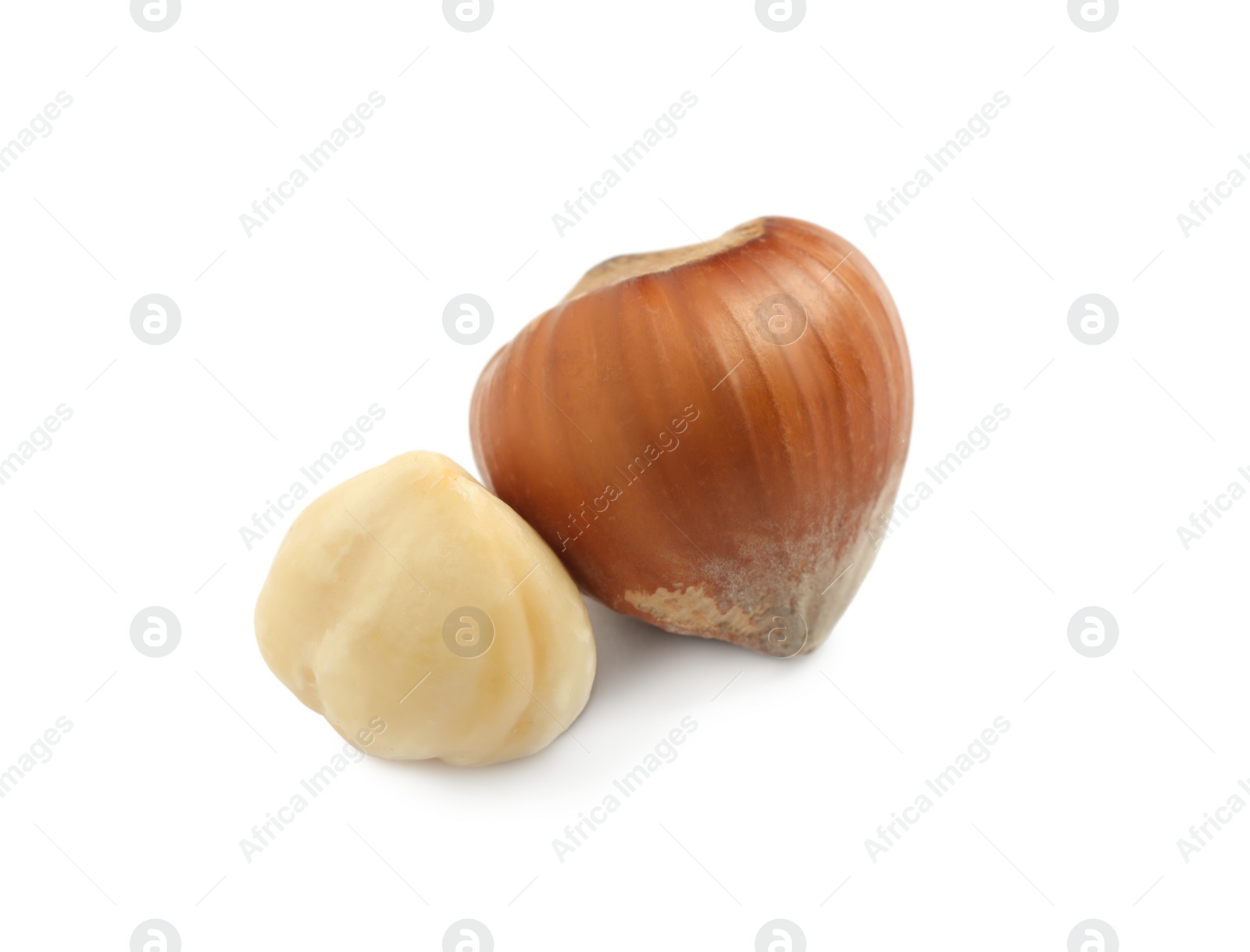 Photo of Tasty organic hazelnuts on white background. Healthy snack