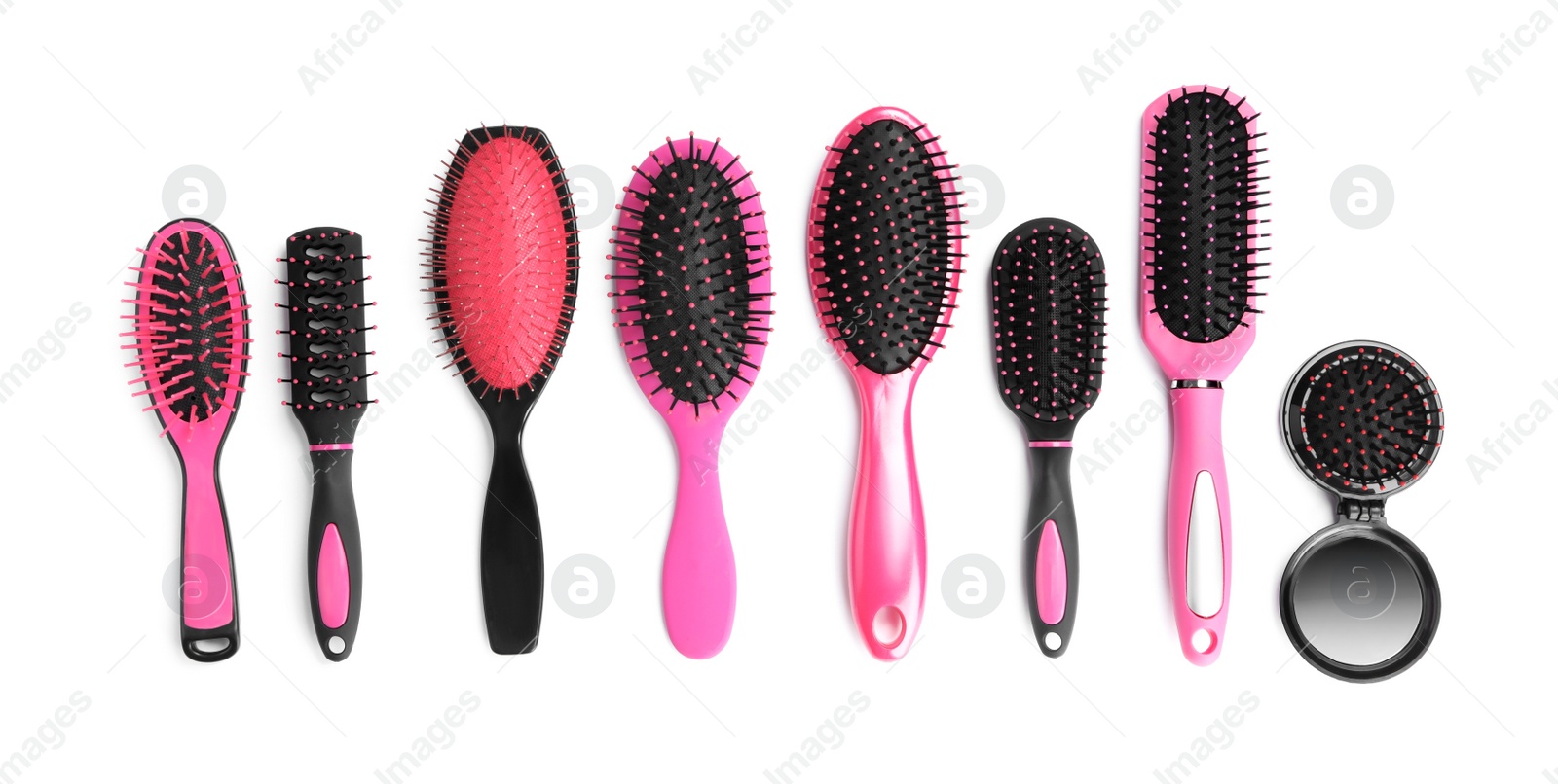 Photo of Set of modern hair brushes isolated on white, top view