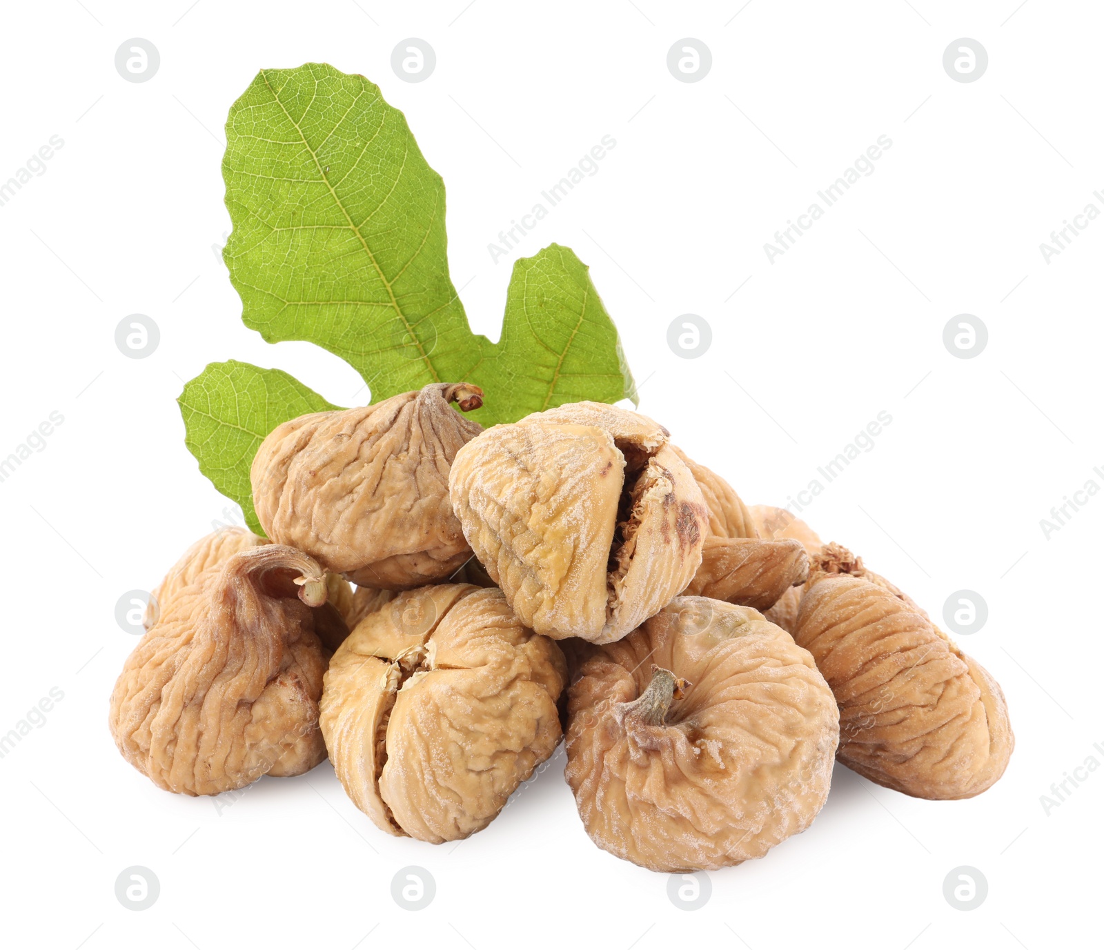 Photo of Tasty dried figs and green leaf isolated on white