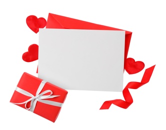 Photo of Blank card, envelope and gift box on white background, top view. Valentine's Day celebration