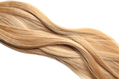 Photo of Locks of healthy blond hair on white background