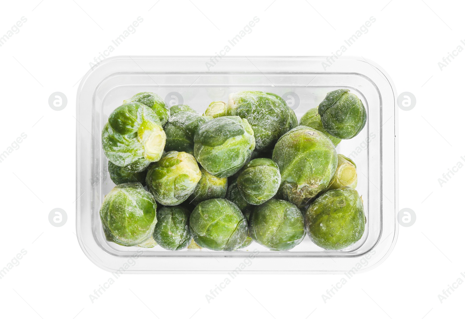 Photo of Frozen Brussels sprouts in plastic container isolated on white, top view. Vegetable preservation