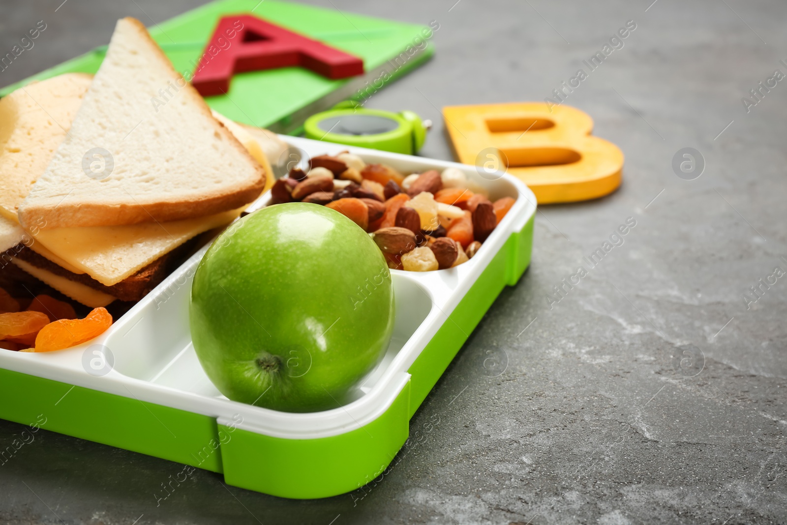 Photo of Lunch box with appetizing food on table