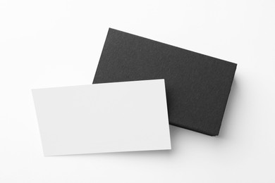 Blank business cards on white background, top view. Mockup for design