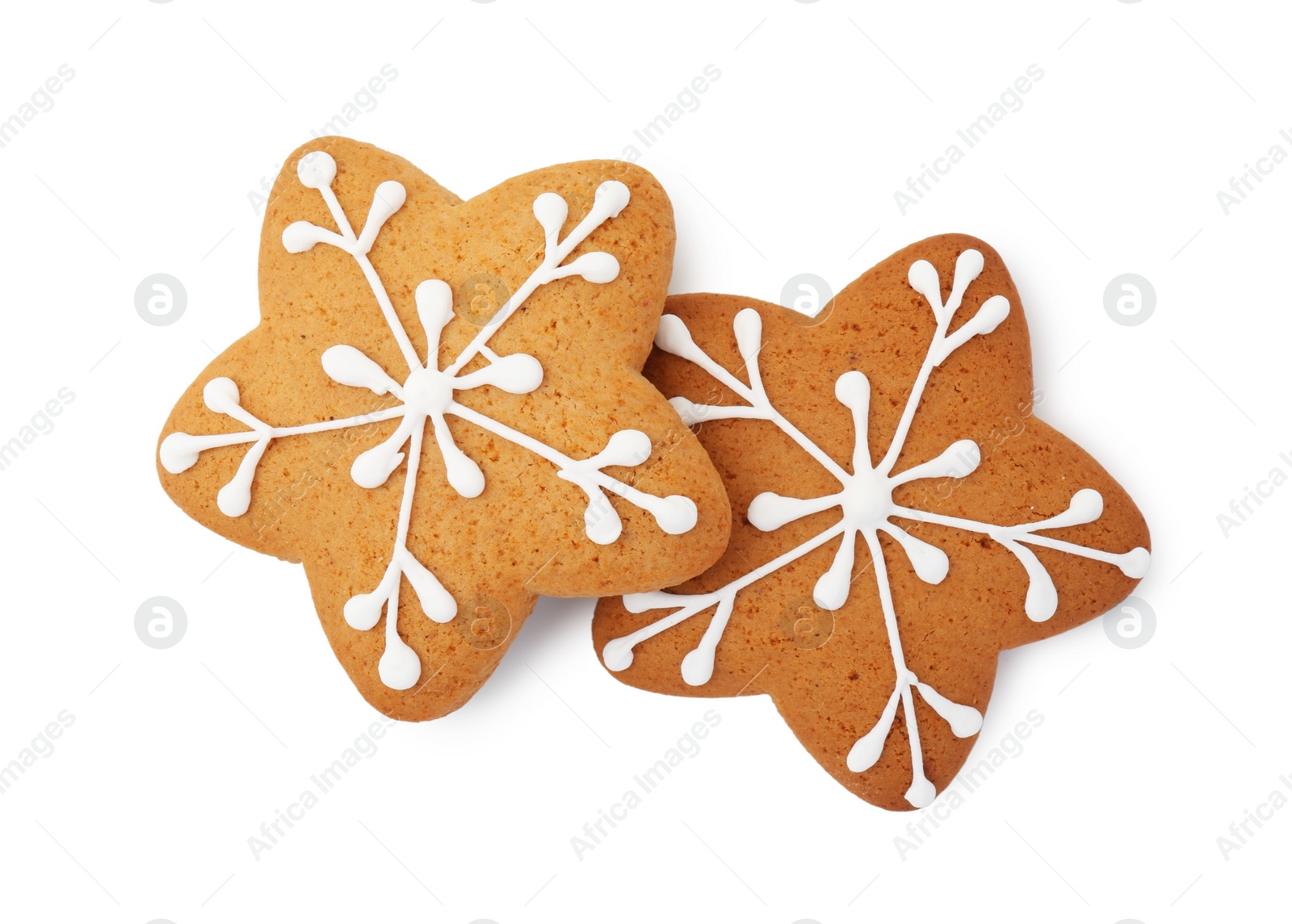 Photo of Tasty star shaped Christmas cookies with icing isolated on white, top view