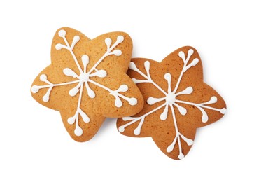 Photo of Tasty star shaped Christmas cookies with icing isolated on white, top view