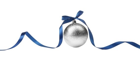 Photo of Beautiful Christmas ball with blue ribbon isolated on white