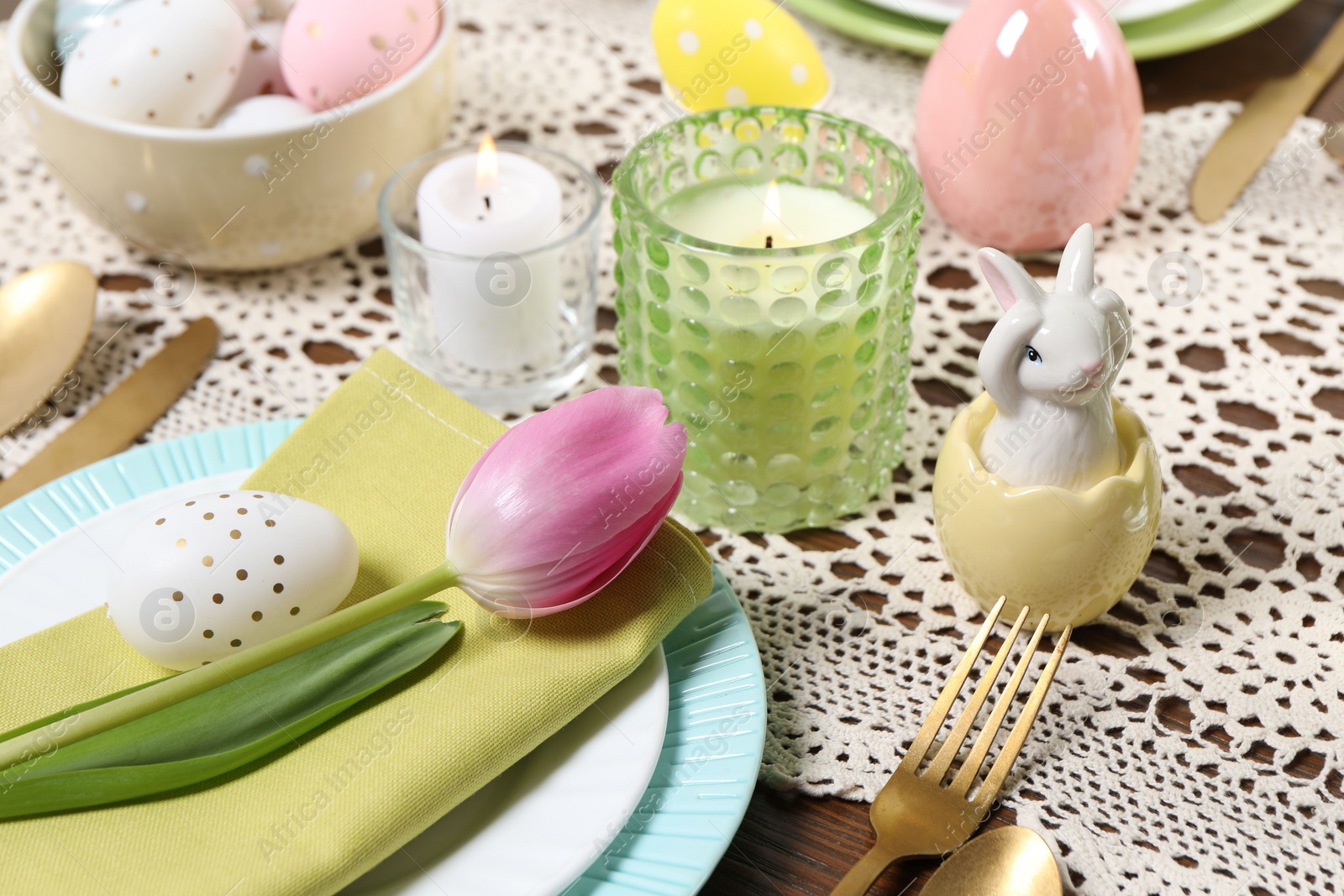 Photo of Festive table setting with beautiful tulip, closeup. Easter celebration