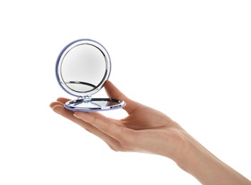 Woman holding stylish cosmetic pocket mirror on white background, closeup