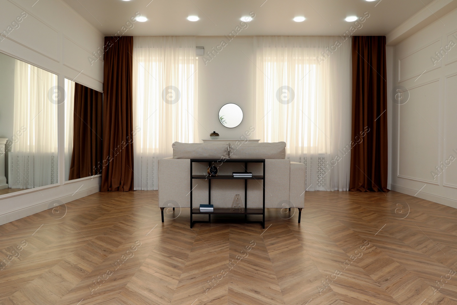 Photo of Modern living room with parquet flooring and stylish furniture