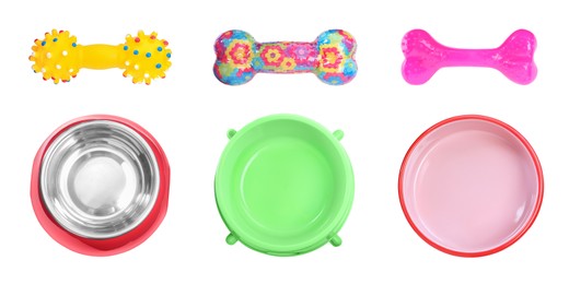 Image of Set with feeding bowls and different toys for pet on white background, top view. Banner design