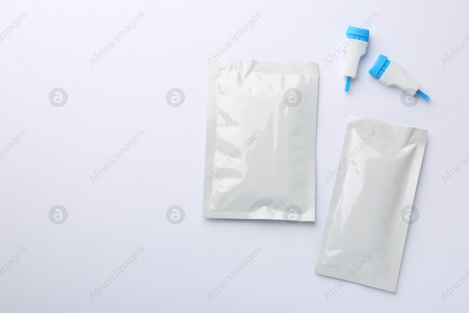 Photo of Disposable express test kit on white background, flat lay. Space for text