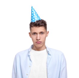 Sad young man in party hat on white background