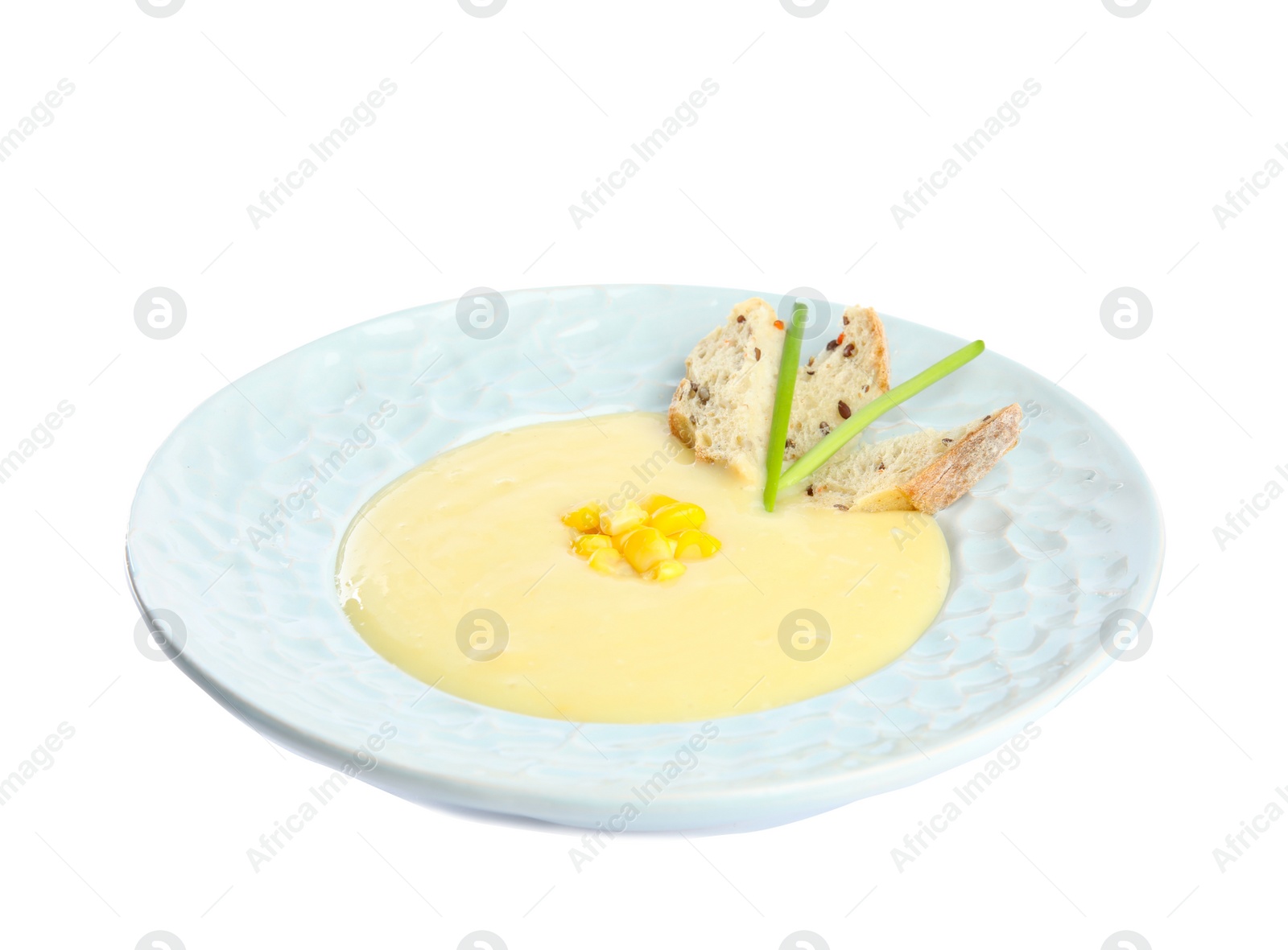 Photo of Delicious corn cream soup isolated on white