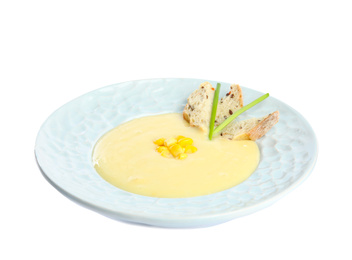 Photo of Delicious corn cream soup isolated on white