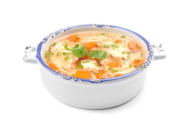 Dish with fresh homemade chicken soup on white background