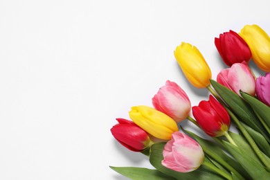 Photo of Beautiful colorful tulips on white background, flat lay. Space for text