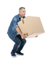 Photo of Full length portrait of mature man lifting carton box on white background. Posture concept