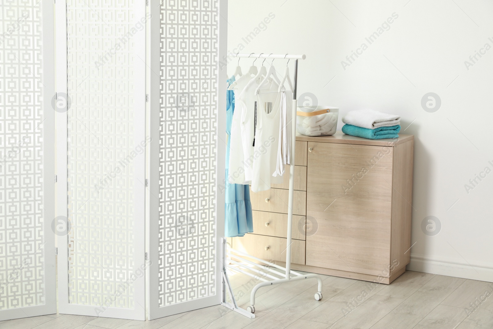 Photo of Modern folding screen in stylish room interior