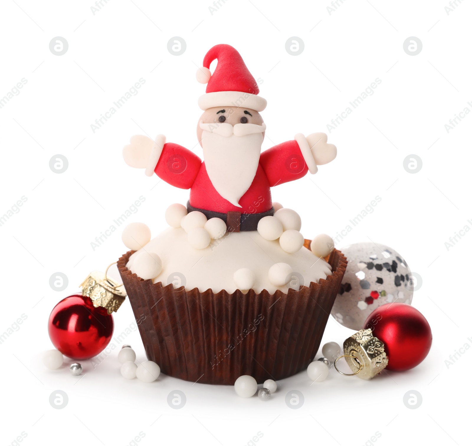 Photo of Tasty cupcake with Santa Claus and Christmas decor on white background