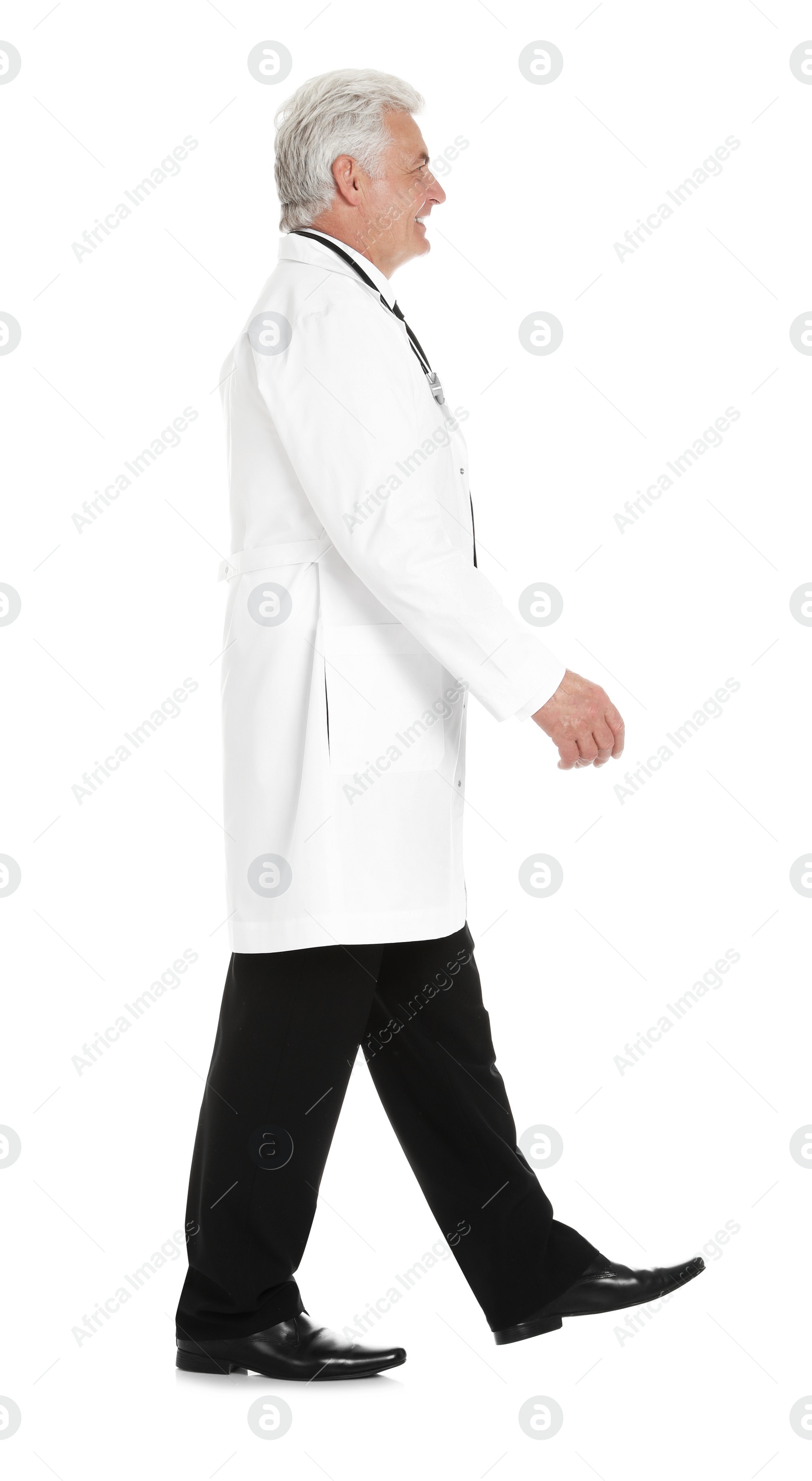 Photo of Full length portrait of male doctor isolated on white. Medical staff