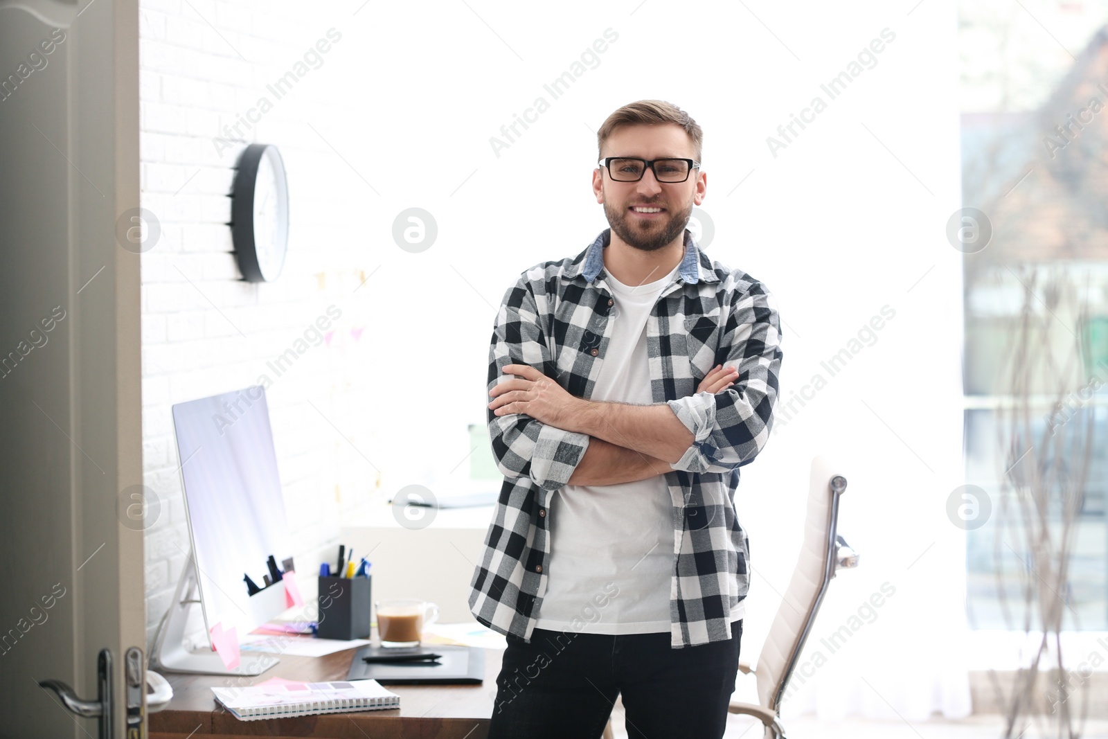 Photo of Portrait of male designer in office. Creative profession