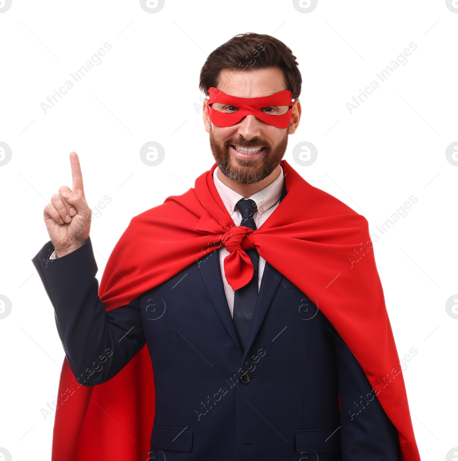 Photo of Happy businessman wearing red superhero cape and mask on white background