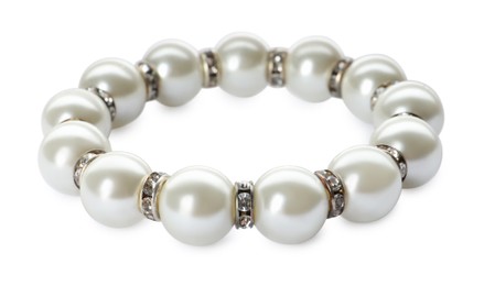 Photo of Elegant pearl bracelet isolated on white. Luxury jewelry