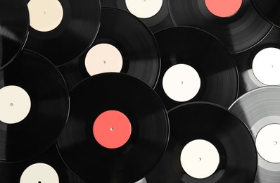 Photo of Many different vintage vinyl records as background, top view