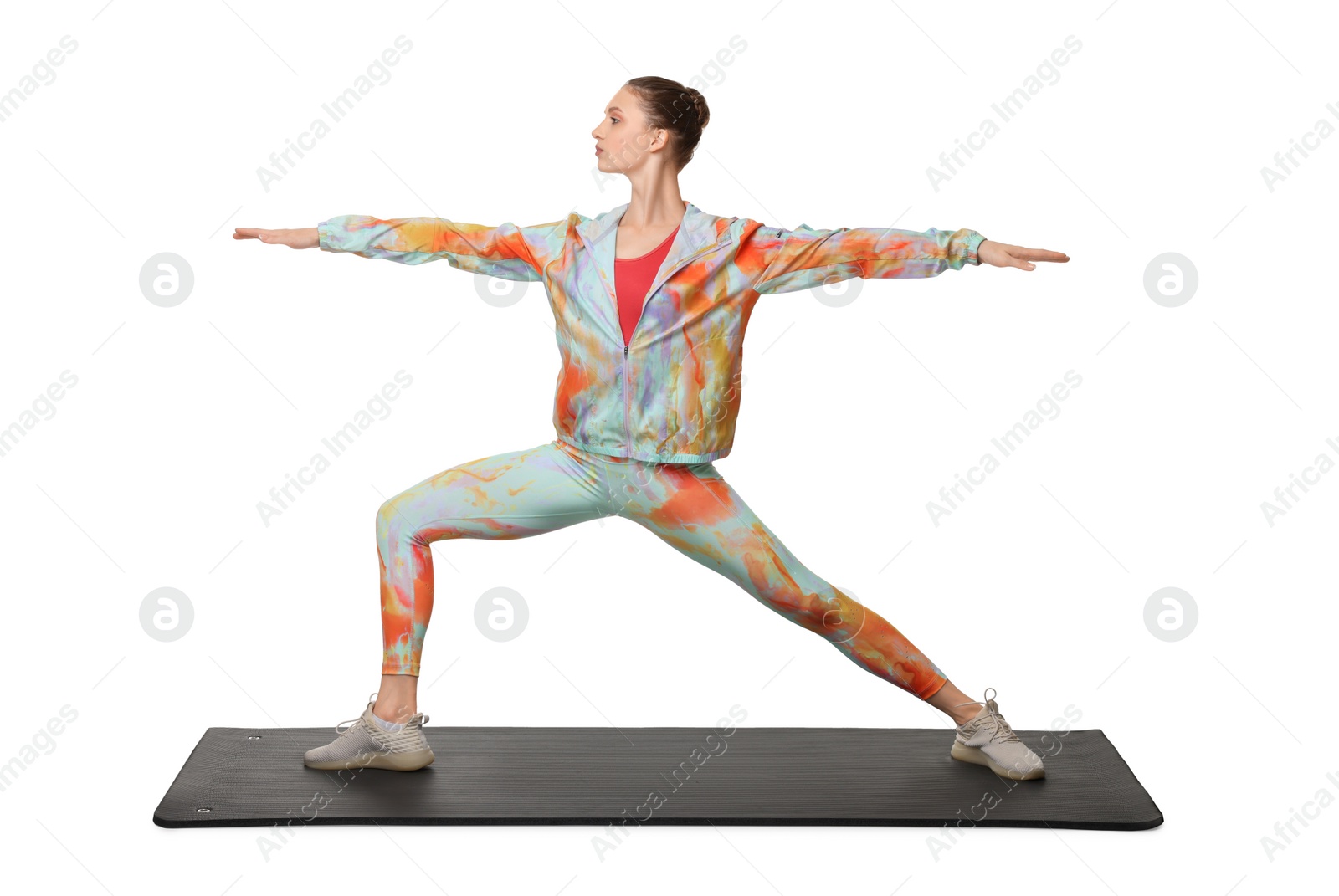 Photo of Young woman practicing yoga on white background